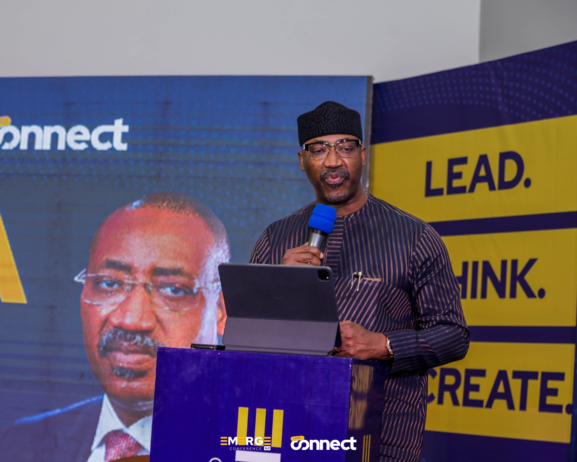 Speaker presenting at the podium