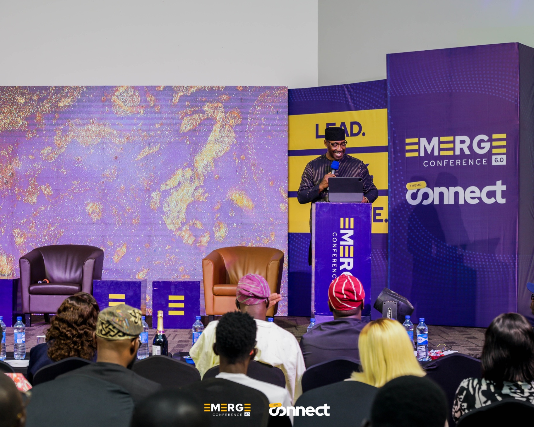 Speaker at the Emerge Conference podium