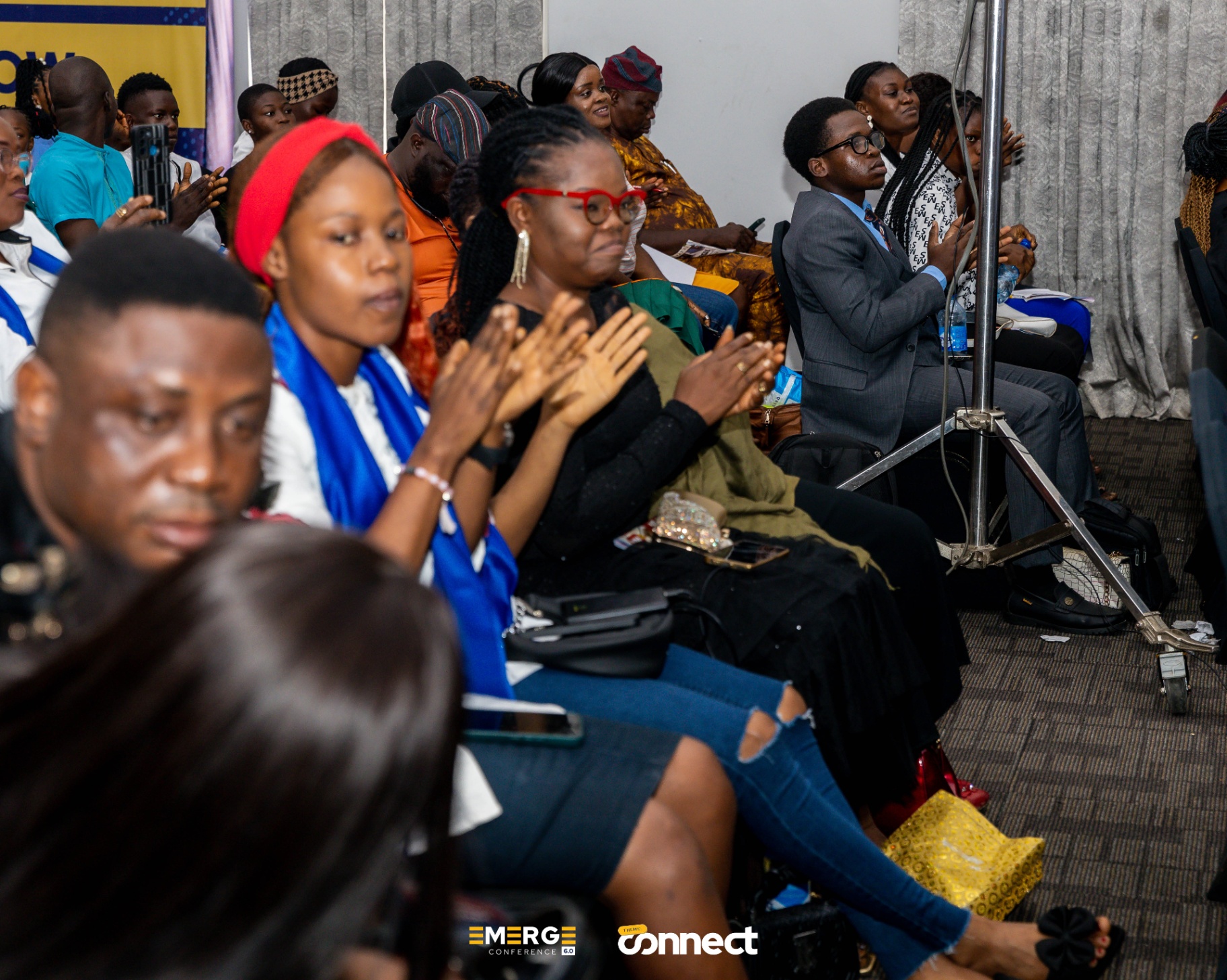 Audience applauding during the session